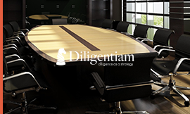 A large conference table representing mitigating risk with Diligentiam’s risk analysis consultants